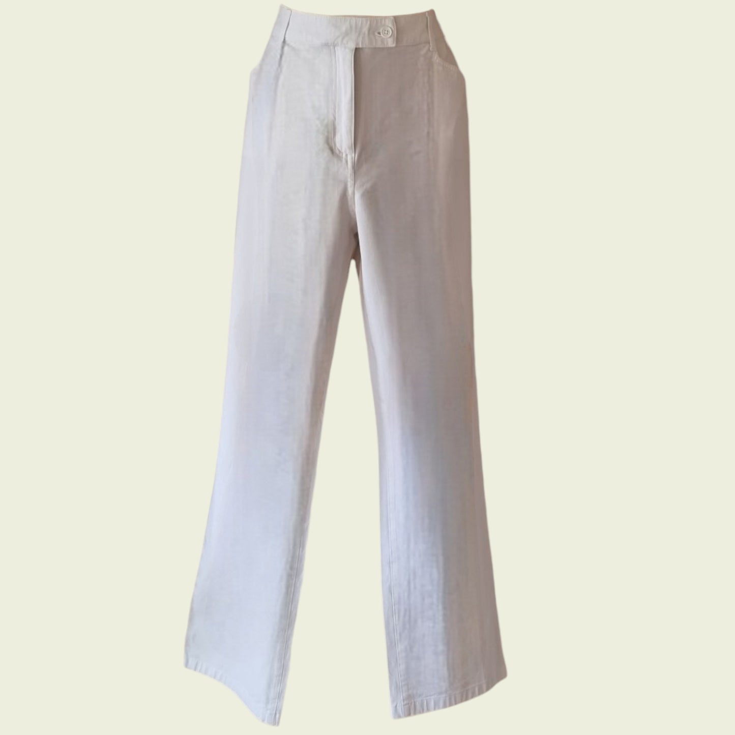 White jeans on a beige background