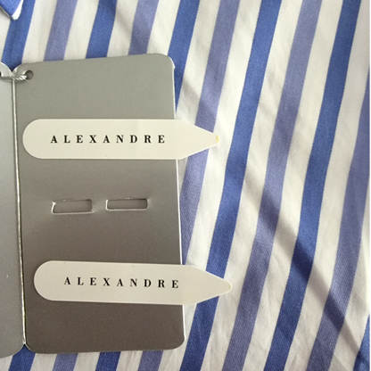 Two 'ALEXANDRE' branded items on a blue and white striped background