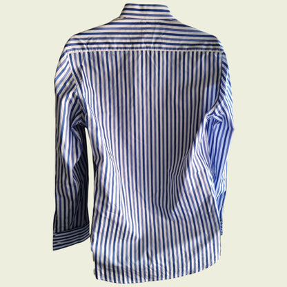 Blue and white striped shirt on a beige background