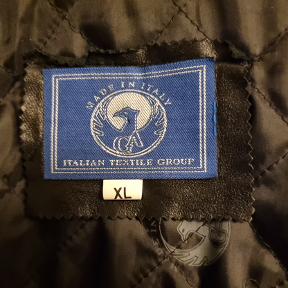 Textile label on a dark fabric background with 'Made in Italy' and 'Italian Textile Group' branding.