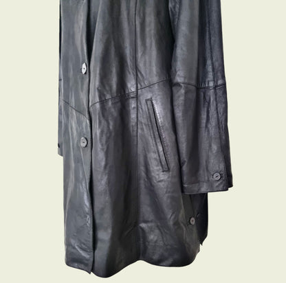 Black leather coat on a beige background