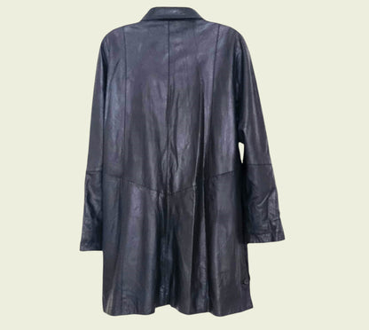 Black leather coat on a light beige background