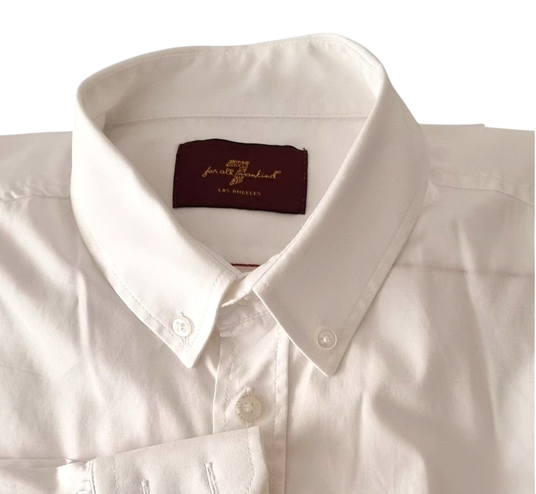 White dress shirt with a brand label on a white background