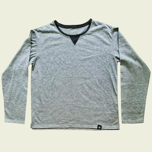 Gray long-sleeve shirt with black trim on a beige background