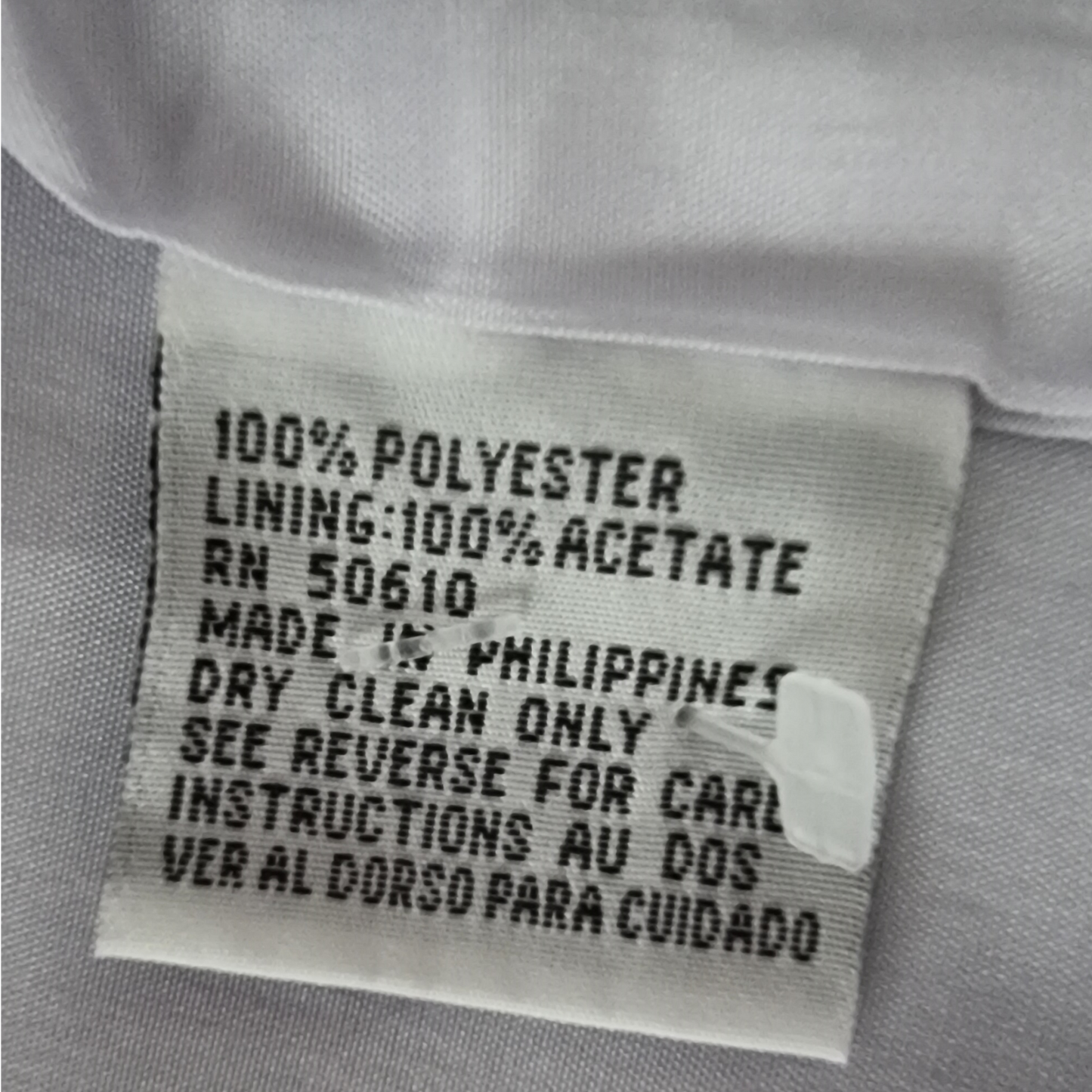 Clothing label with text on a garment