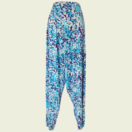 Aqua colour pants on  beige background