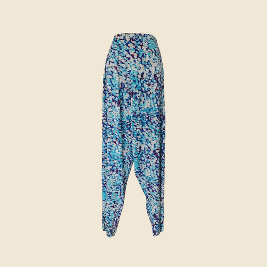 Patterned pants on a beige background