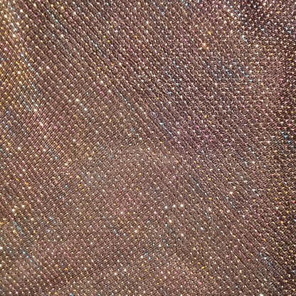 Close-up of a textured black fabric with a subtle pattern