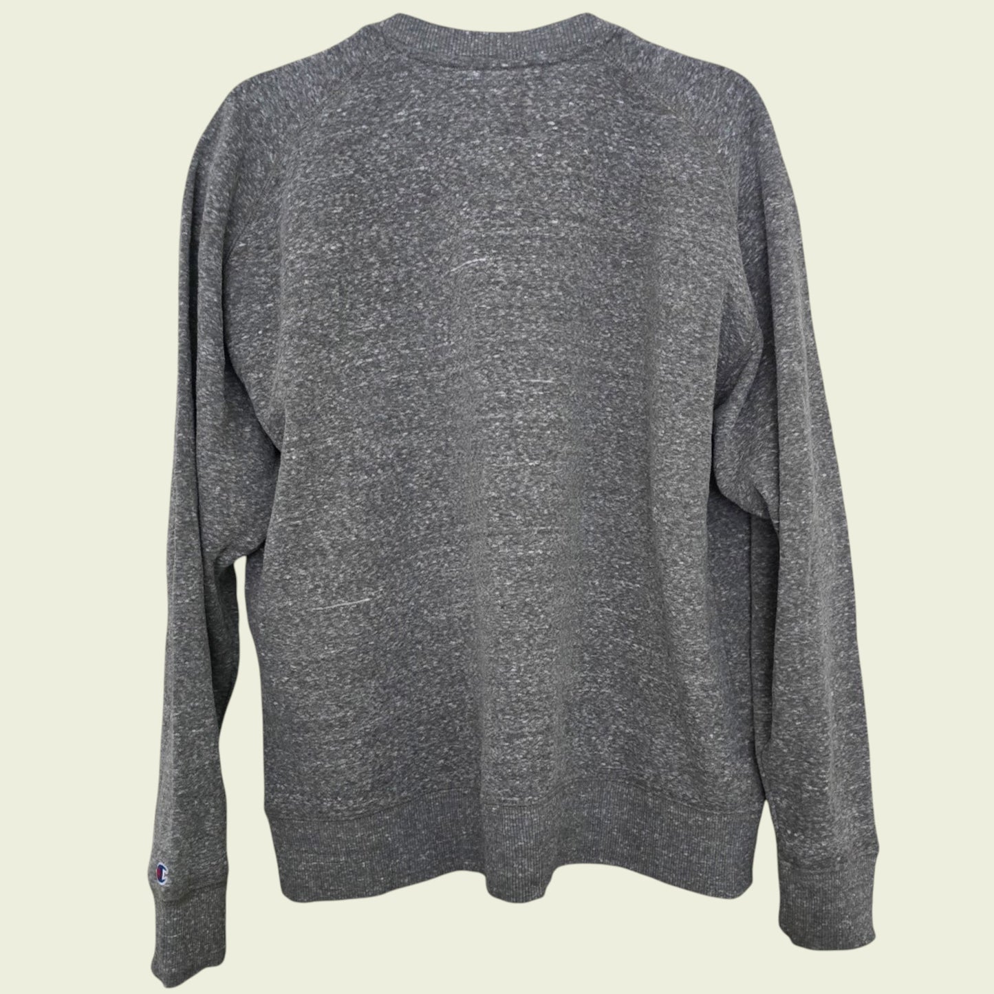 Gray sweater on a beige background