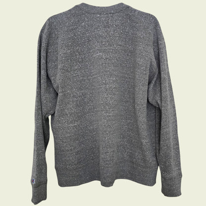 Gray sweater on a beige background