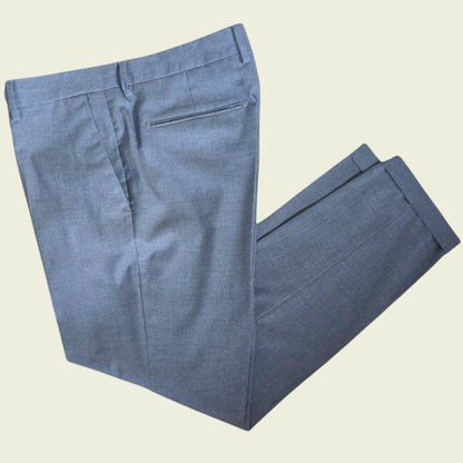 Grey pants on a beige background