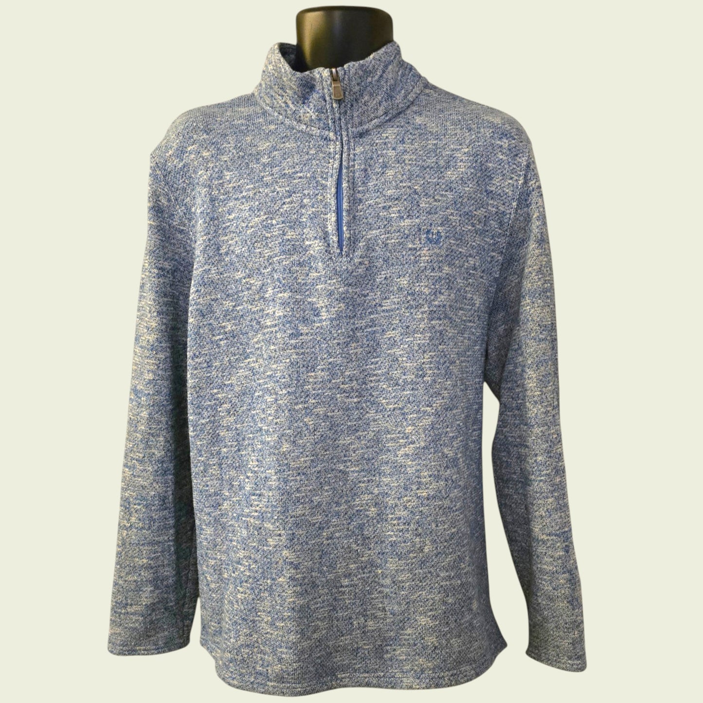 Blue and gray marled pullover on a mannequin against a white background