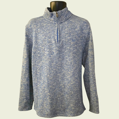 Blue and gray marled pullover on a mannequin against a white background