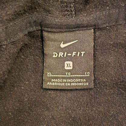Dri-Fit label on a dark fabric background