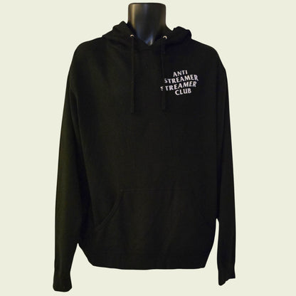 Black hoodie with text on a mannequin against a beige background