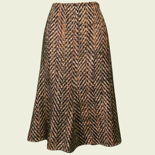 Brown tweed skirt on beige background
