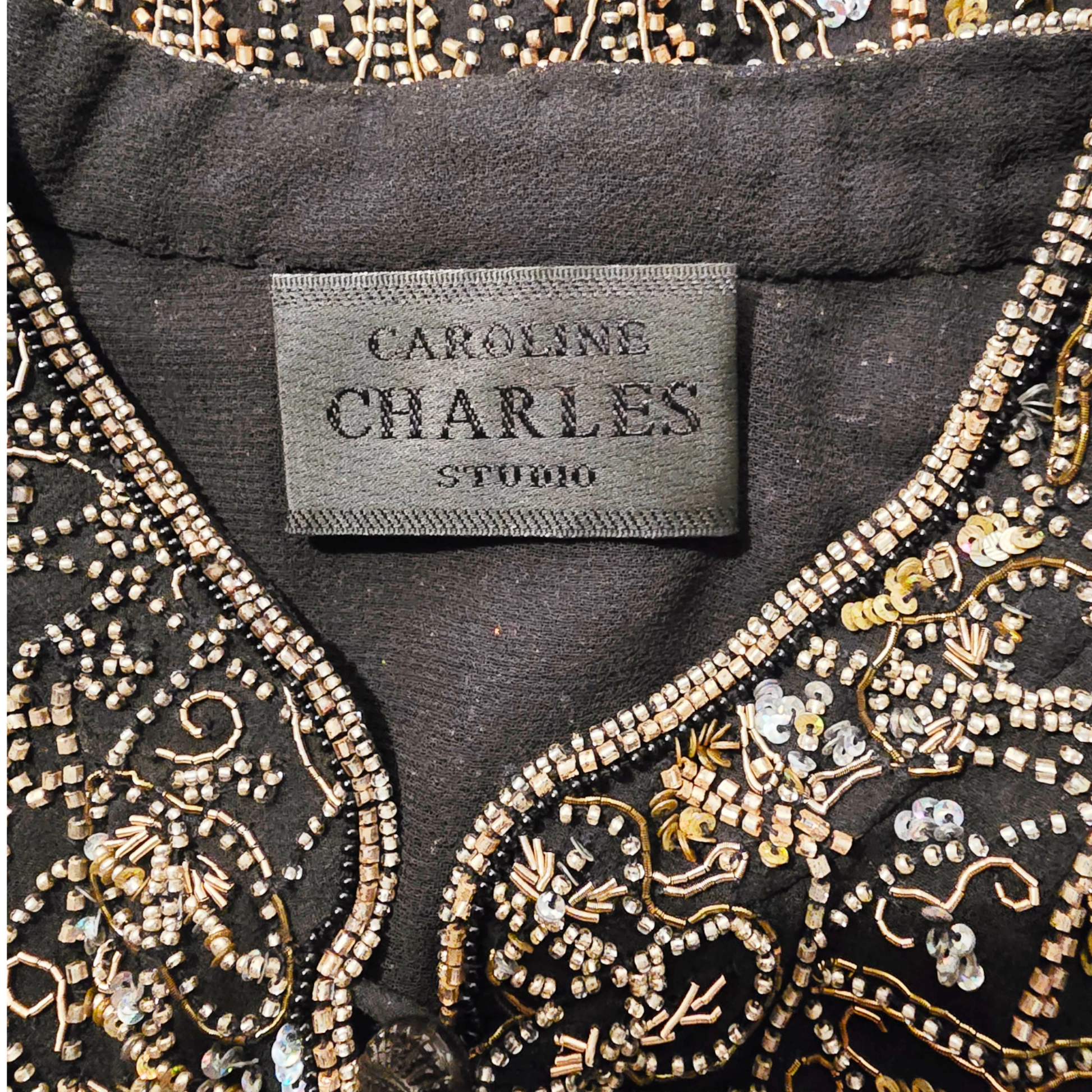 Embroidered garment with 'Caroline Charles Studio' label