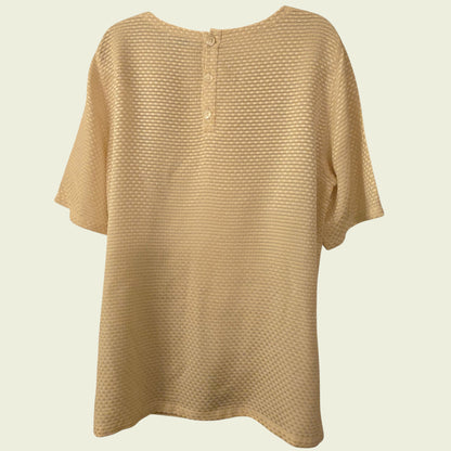 Beige textured shirt on a beige background