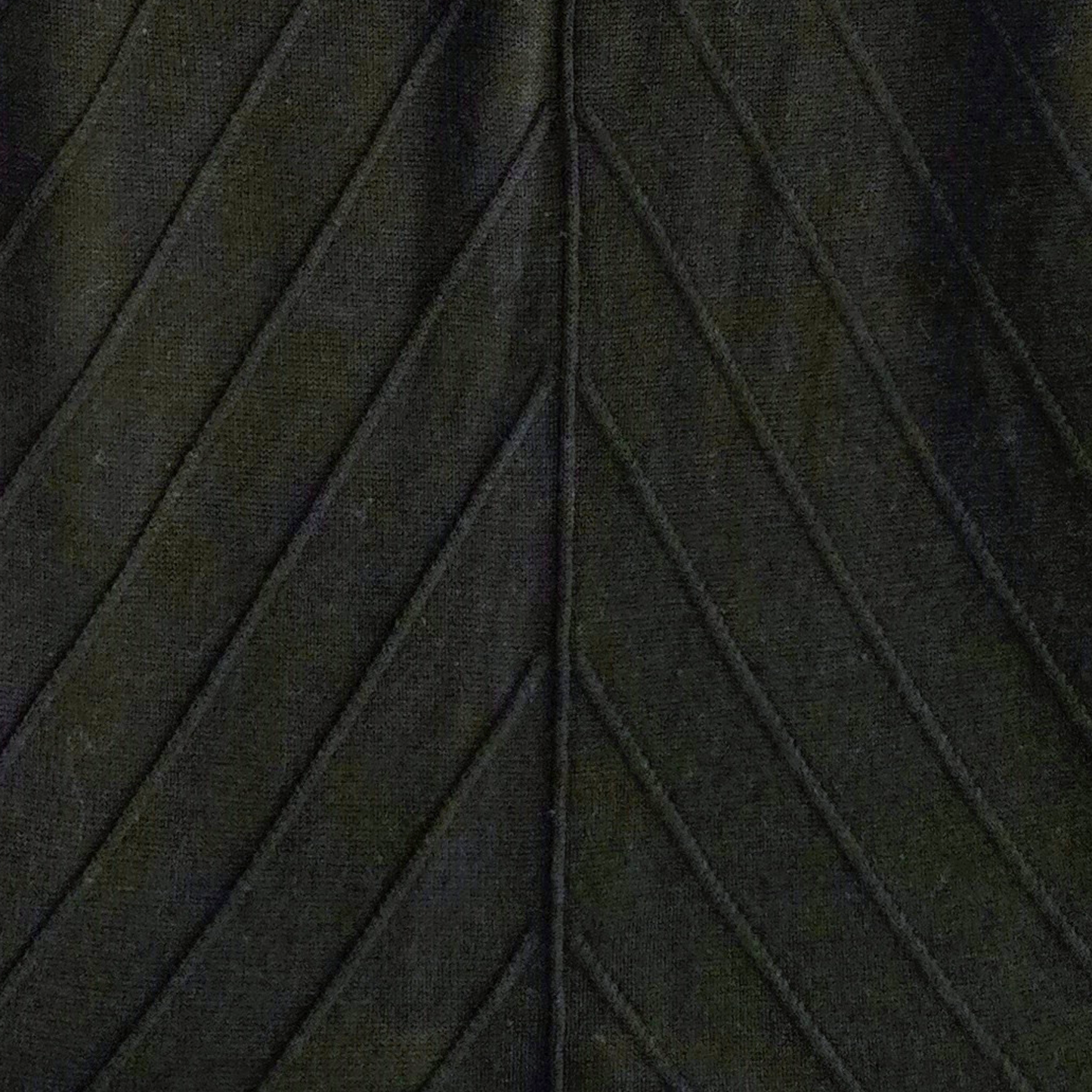 Close-up of black fabric with a textured pattern