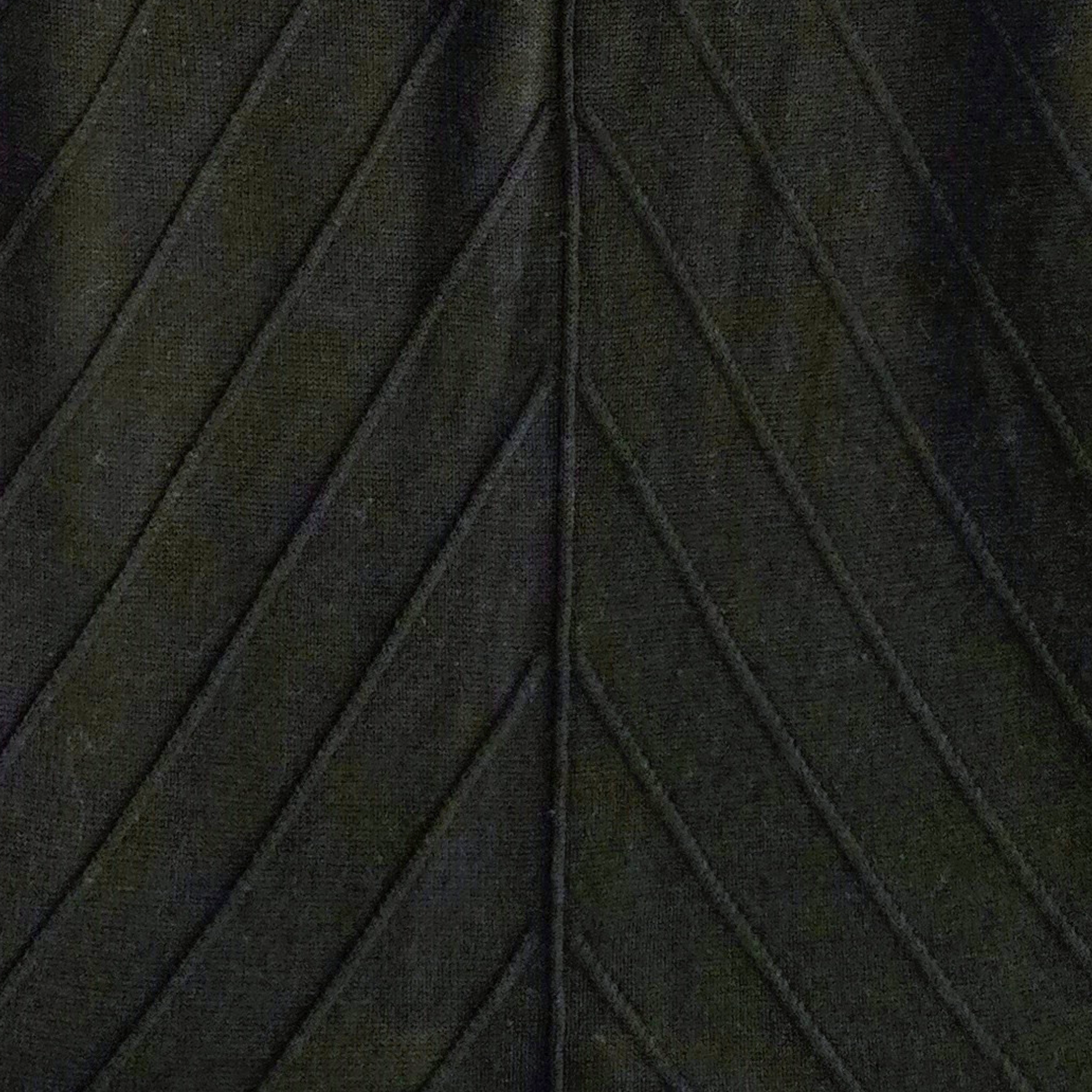 Close-up of black fabric with a textured pattern