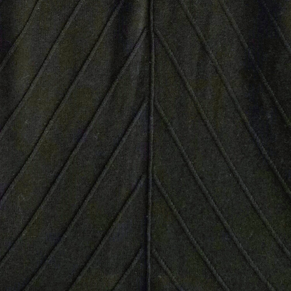 Close-up of black fabric with a textured pattern