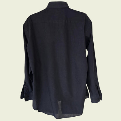 Black shirt on a beige background