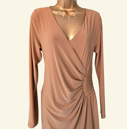Brown dress on a mannequin with a plain background