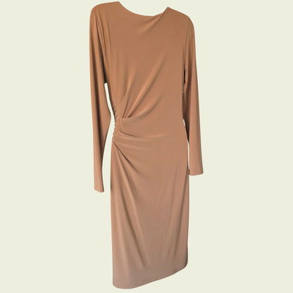 Brown dress with long sleeves on a beige background