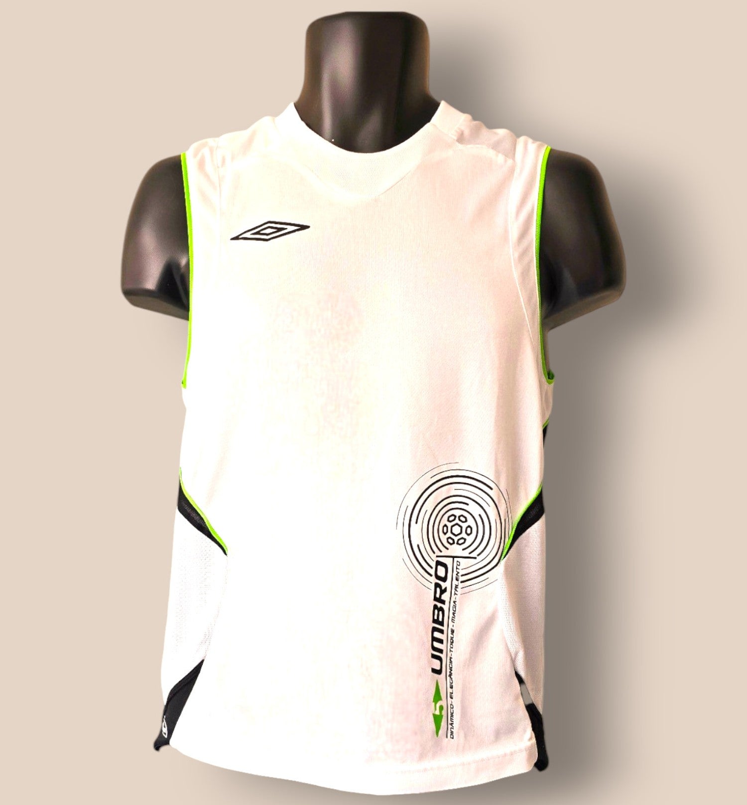 White sleeveless sports jersey with green accents on a mannequin against a beige background