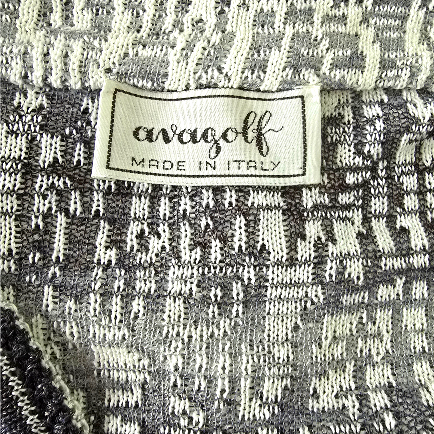 Clothing label showing Avagolf on textured background