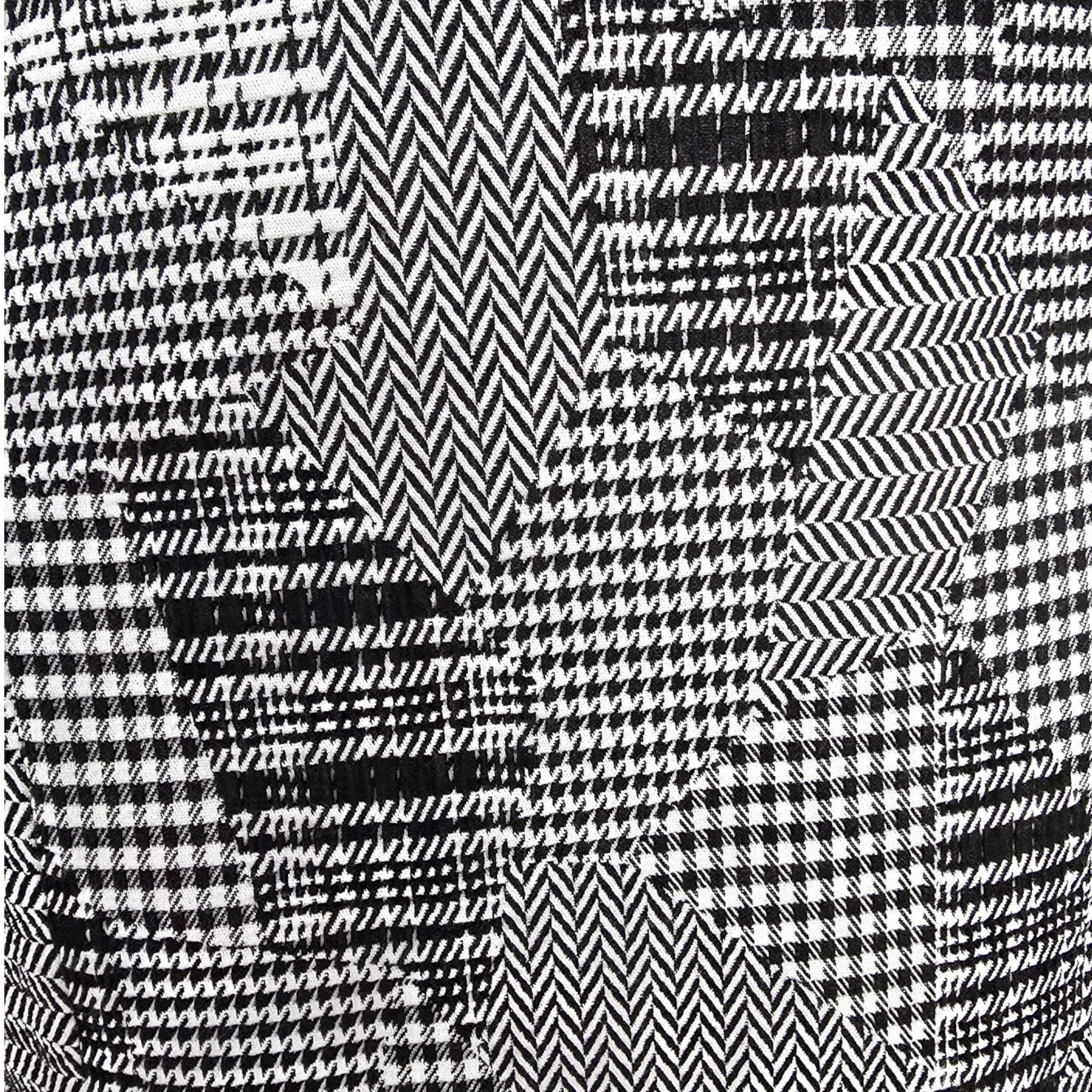 Black and white geometric patterned fabric texture