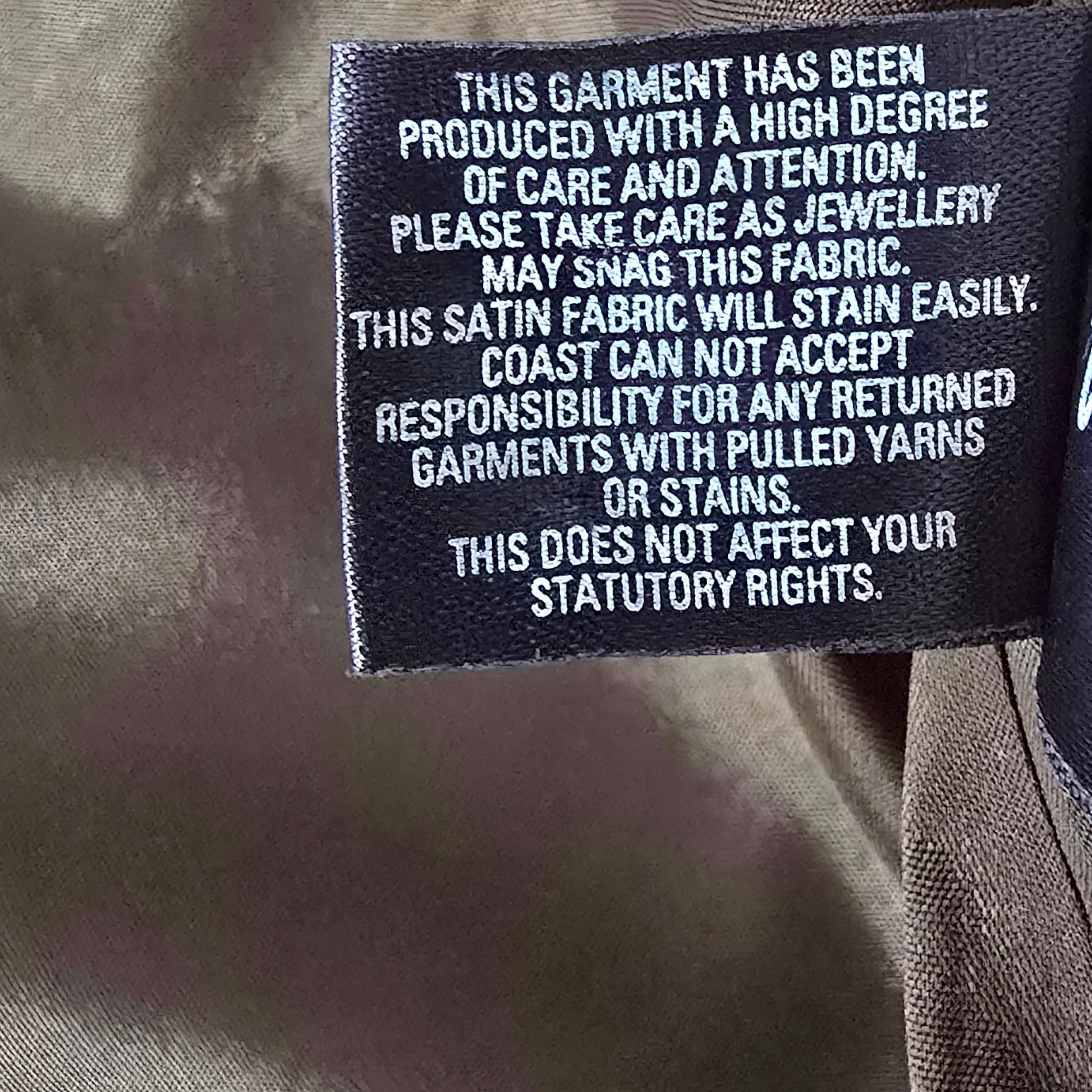 Garment label on green background