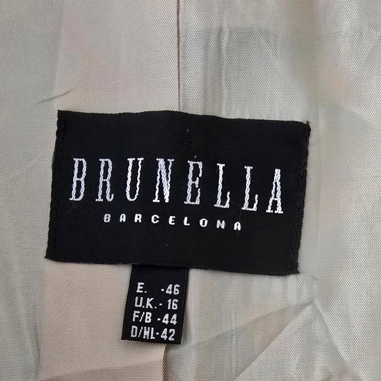 Clothing label with Brunella on a grey background