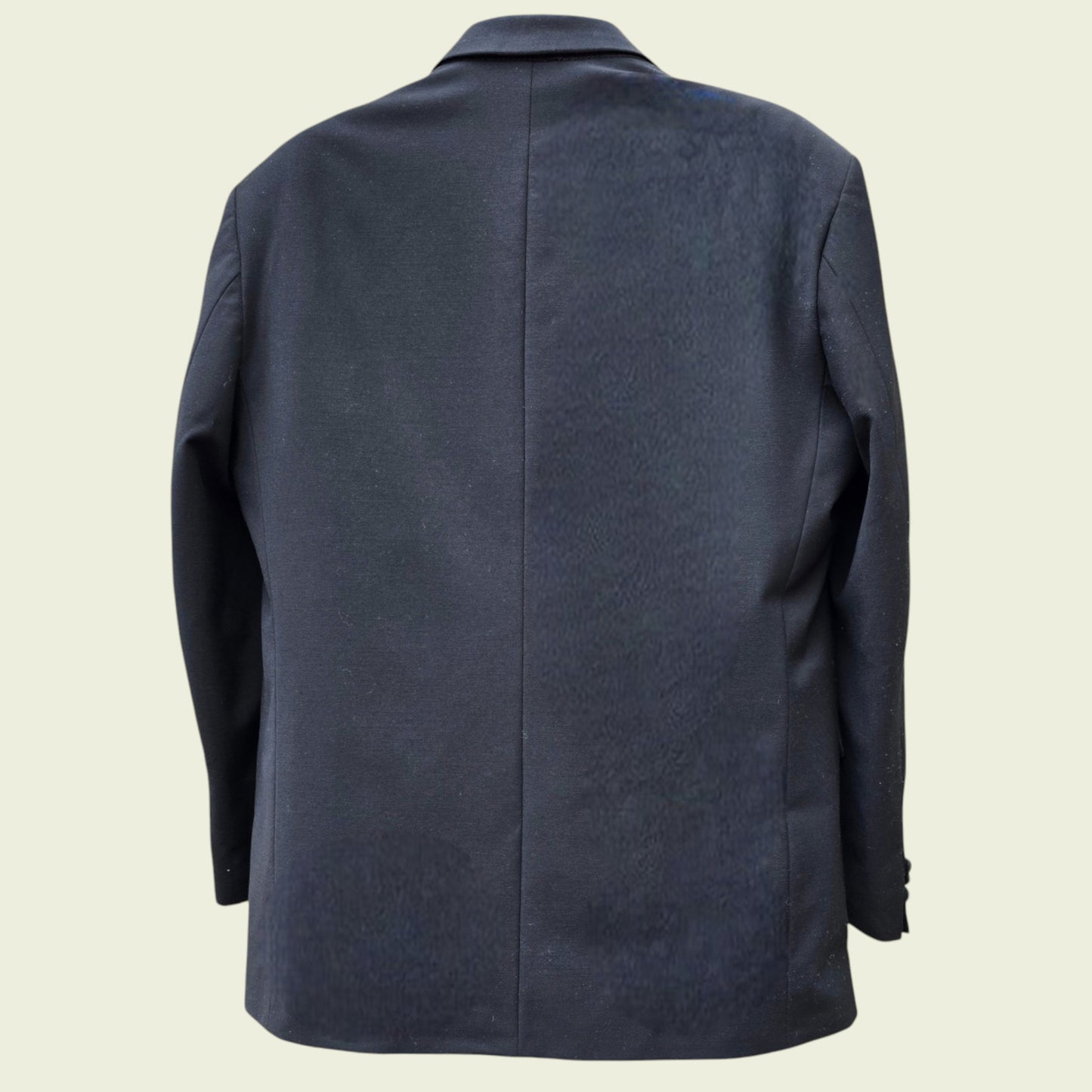 Grey jacket on a beige background