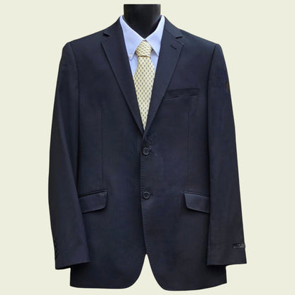Dark blue suit jacket with a light blue shirt and yellow tie on a beige background