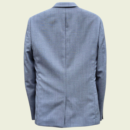 Grey checkered blazer on a beige background