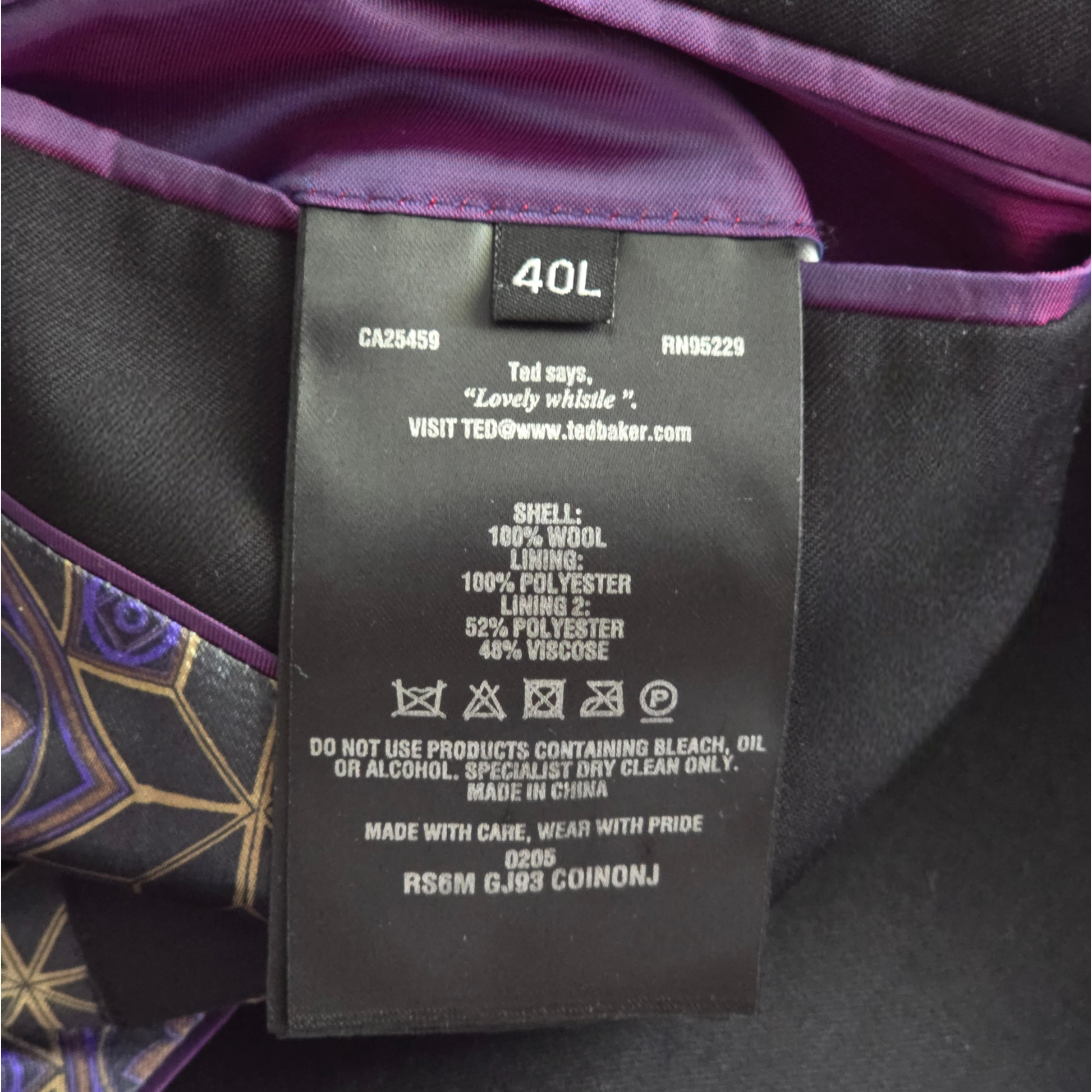 Label on jacket with specifications and care instructions.