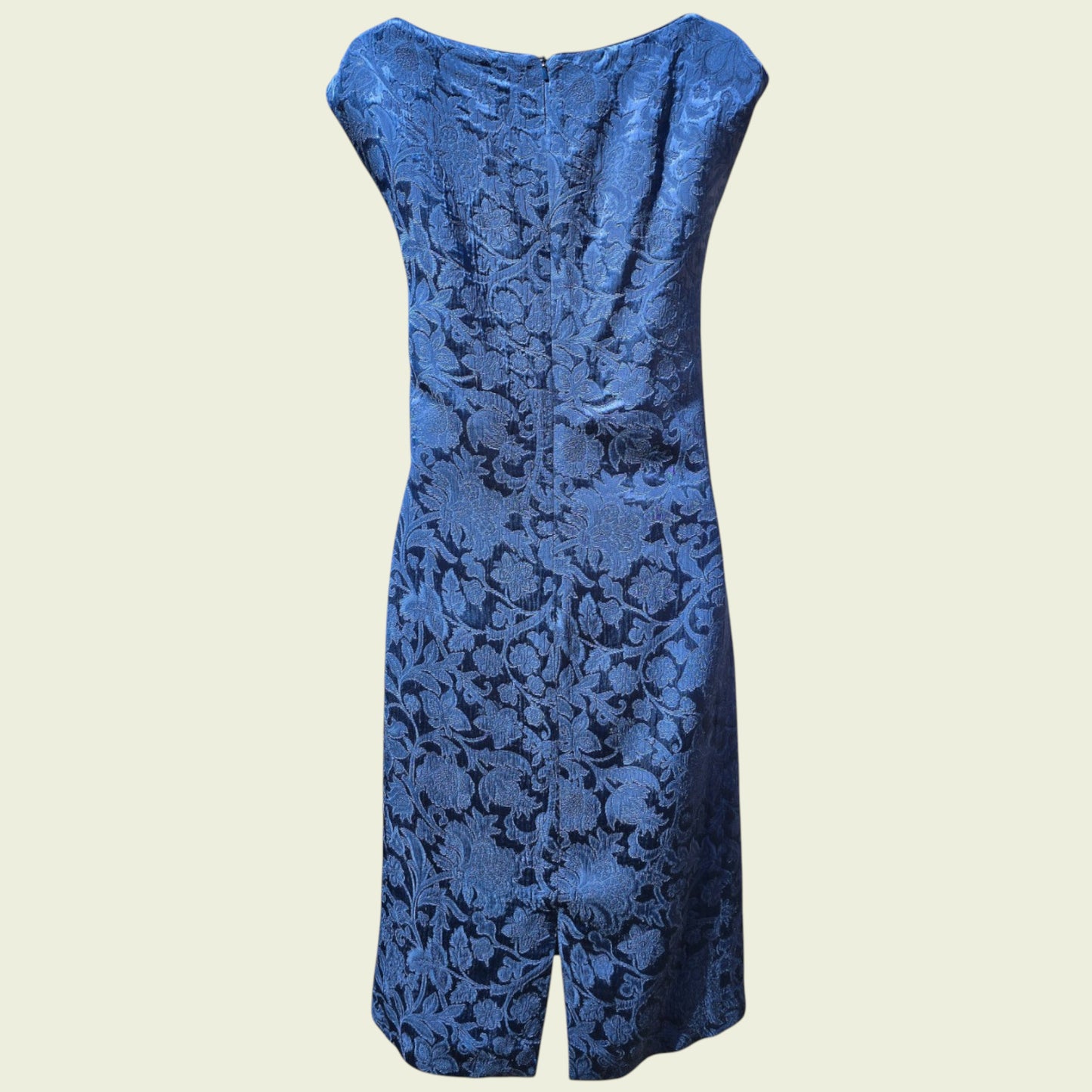 Midnight blue dress on a beige background