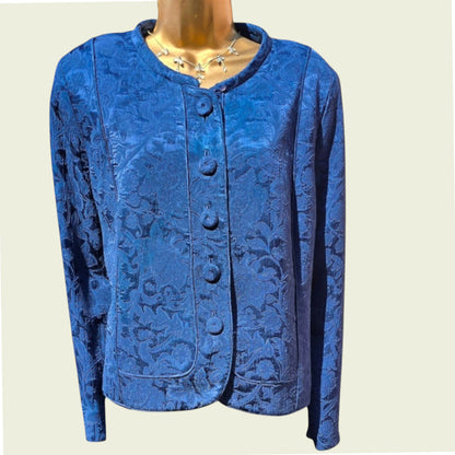 Mannequin wearing a midnight blue jacket on a beige background