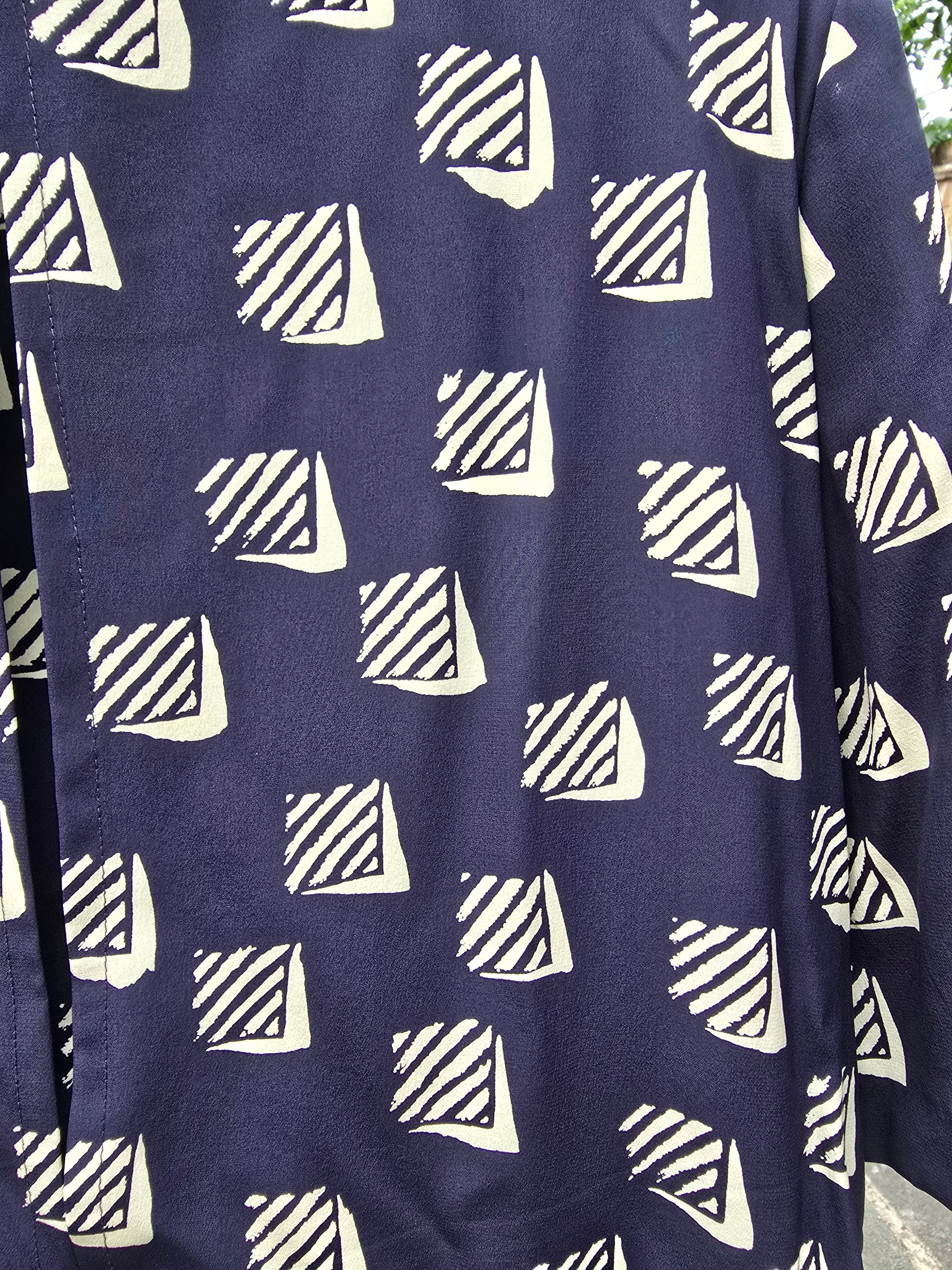 Navy blue fabric with white geometric pattern