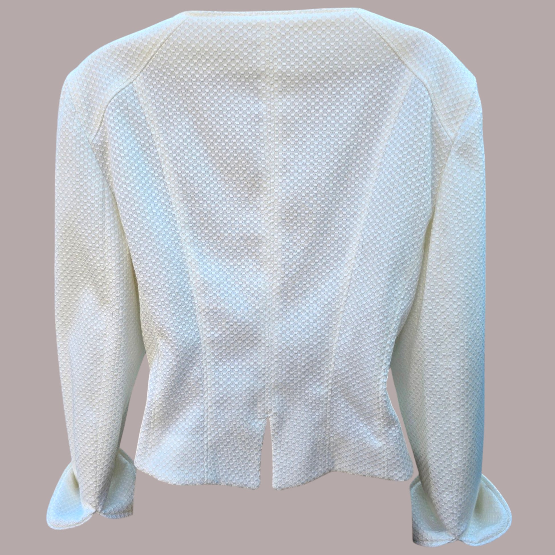 White textured jacket on a plain background