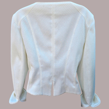 White textured jacket on a plain background