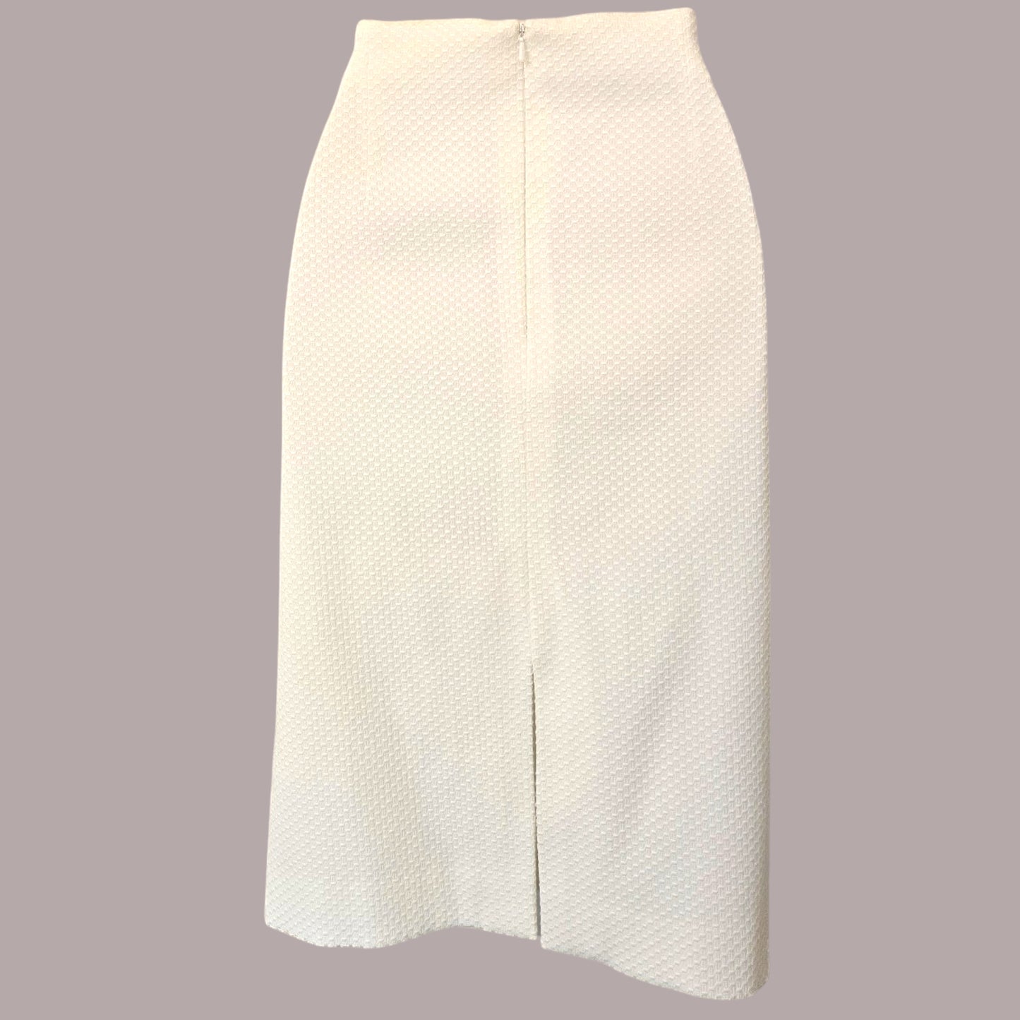White textured skirt on a gray background
