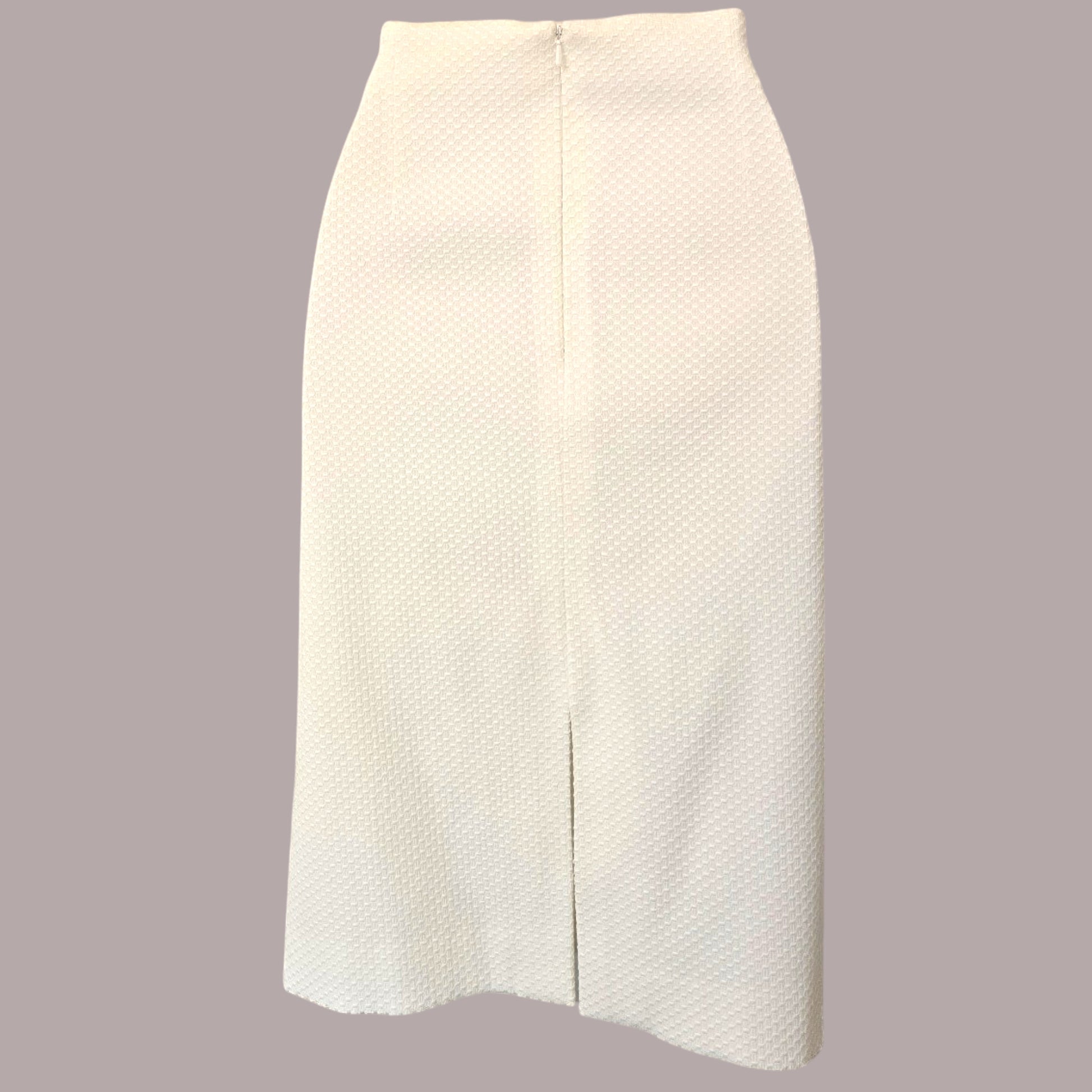 White textured skirt on a gray background