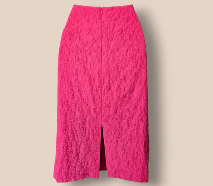 Pink textured skirt on a beige background
