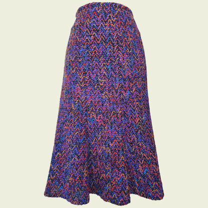 Colorful zigzag patterned skirt on a beige background