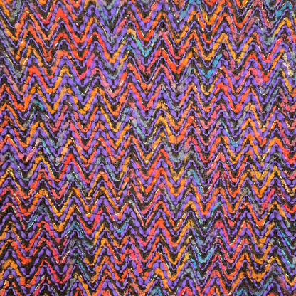Multicolored zigzag pattern on a textured fabric background