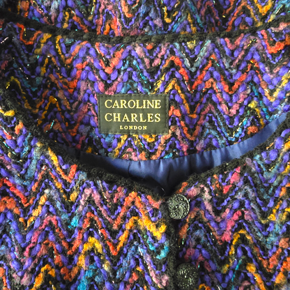 Multicolored zigzag patterned fabric with 'Caroline Charles London' label