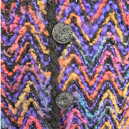 Multicolored textured fabric with black buttons