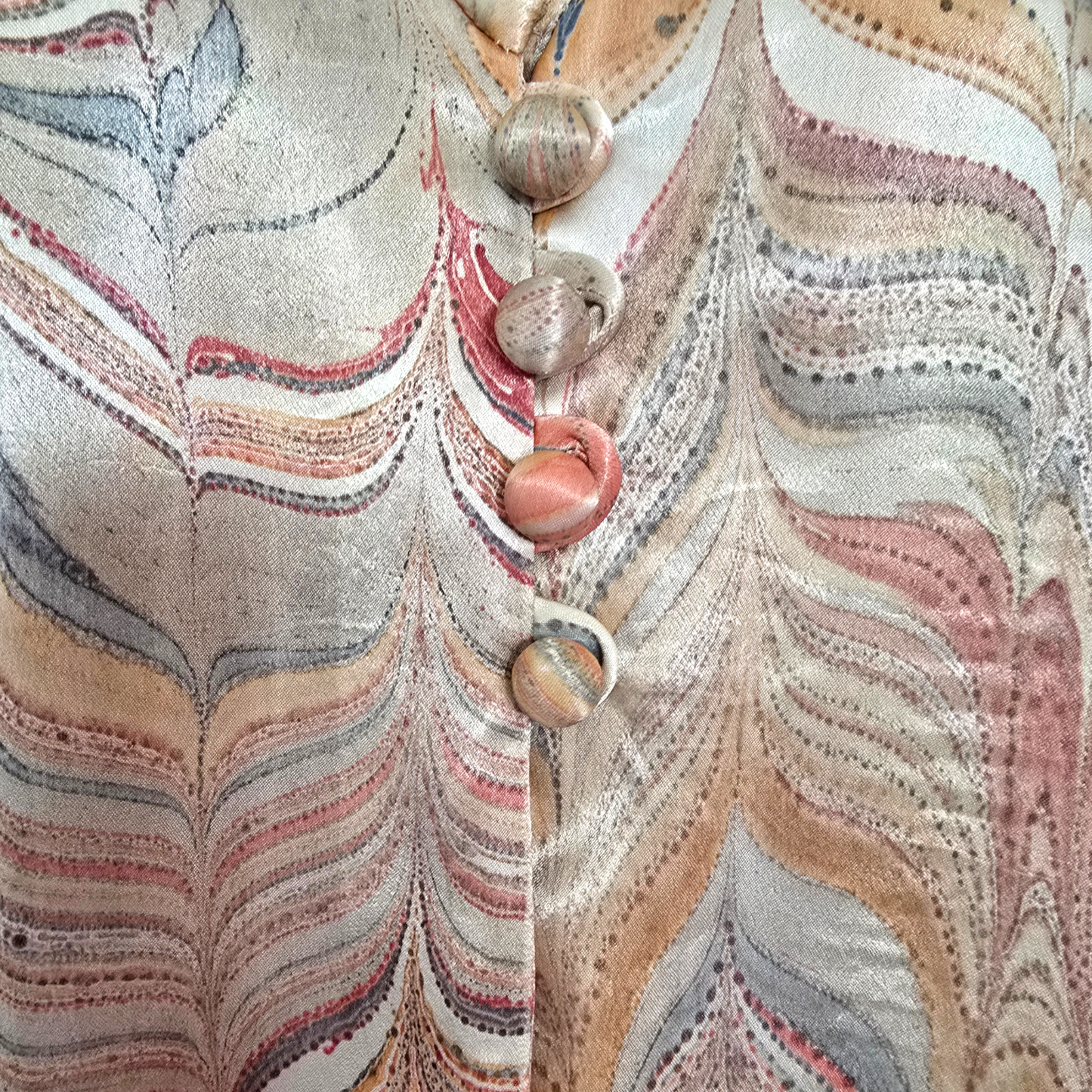 Close-up of a patterned fabric with buttons